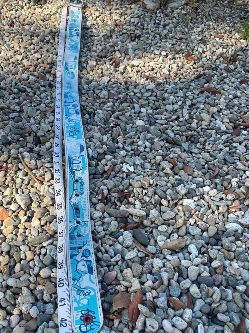Vintage 80s blue and white FFLY Hope project leather belt with silver buckle.